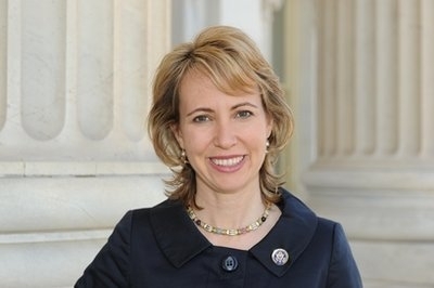 FILE - In this March, 2010 file photo provided by the office of Rep. Gabrielle Giffords, D-Ariz., Giffords poses for a photo.