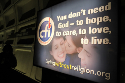 A new ad, launched by the Center for Inquiry on Tuesday, March 2, 2011, is seen here at the Farragut West Metro station in Washington, D.C.