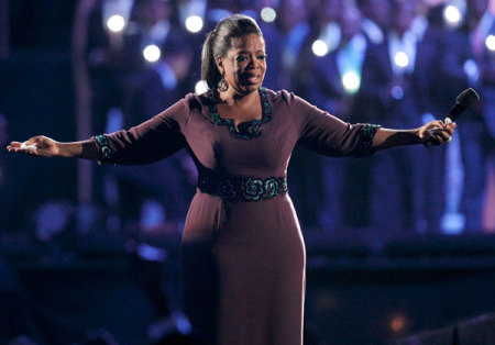 Oprah Winfrey gestures during the taping of 'Oprah's Surprise Spectacular' in Chicago May 17, 2011. Winfrey kicked off one of her last-ever national talk shows on Tuesday with hugs from Tom Hanks, Tom Cruise and Madonna in a packed Chicago arena.