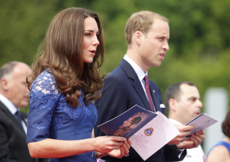 Britain's Prince William and his wife Catherine, Duchess of Cambridge, take part in a prayer service on board the HMCS Montreal in Quebec City July 3, 2011. Prince William and his wife Catherine are on a royal tour from June 30 to July 8.