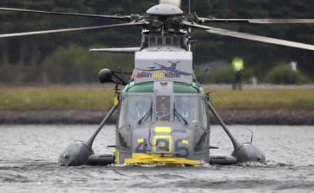 A Canadian forces Sea King helicopter flown by Britain's Prince William lands on Dalvay lake in a routine called 'waterbirding' in Dalvay-by-the-sea July 4, 2011.