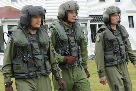 Prince William prepares to board the Sea King helicopter before taking part in a waterbird practice exercise in front of thousands of spectators in Canada, July 4, 2011.