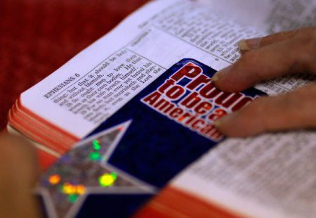 Priscilla Gammon reads along in her Bible during a weekly Bible study meeting at the West Unity Methodist Church in Unity, New Hampshire July 5, 2011.