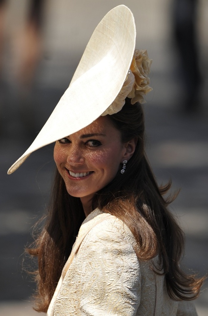 Britain's Catherine, Duchess of Cambridge arrives for the wedding between Zara Phillips, the eldest granddaughter of Queen Elizabeth, and England rugby captain Mike Tindall, at Canongate Kirk in Edinburgh, Scotland July 30, 2011