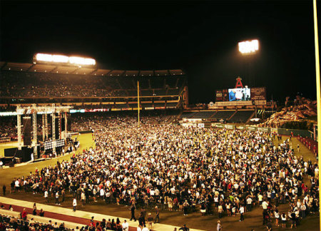 A total of 115,000 attended the 2011 Harvest Crusade in Anaheim, Aug. 12-14. More than 12,000 people made decisions for Christ over the three days, led by evangelist Greg Laurie.