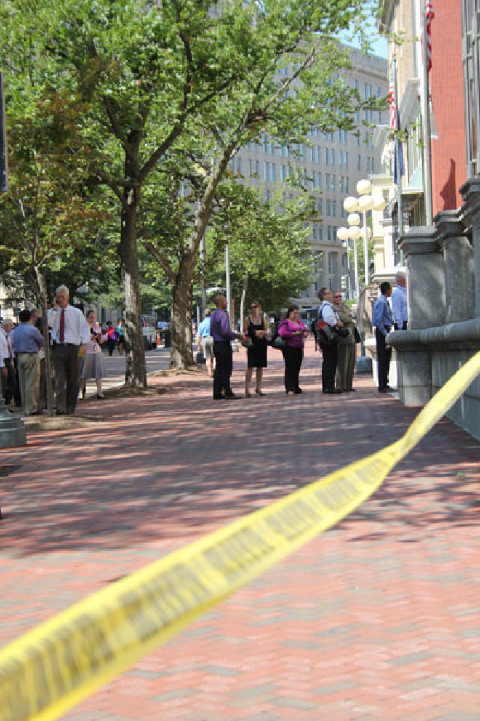 Workers at the U.S. Treasury Annex building, across the street from the White House, wait in line to reenter the building after being evacuated because a reportedly 5.9 magnitude earthquake centered in central Virginia struck at 1:51 p.m. on Tuesday, August 23, 2011. The quake could be felt from Toronto to Georgia.