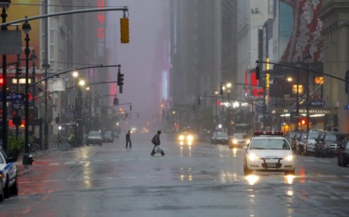 A view of a nearly deserted 7th Avenue near Times Square in Manhattan as Hurricane Irene closed in on the New York City area August 28, 2011. Hurricane Irene battered New York with heavy winds and driving rain on Sunday, shutting down the U.S. financial capital and most populous city, halting mass transit and causing massive power blackouts as it churned slowly northward along the eastern seaboard.