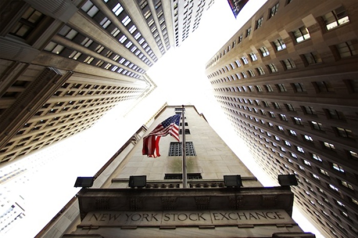 A flag flies on outside of the New York Stock Exchange building in New York in this May 6, 2010 file photo.