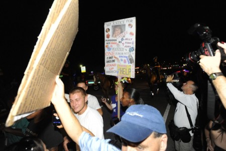 Crowds react as Casey Anthony and her lawyer Jose Baez leave the Orange County Jail in Orlando, Florida July 17, 2011. Anthony was released from a Florida jail on Sunday to resume the life interrupted three years ago when she was charged with the murder of her 2-year-old daughter Caylee. Anthony was acquitted by a jury on July 5 of culpability in Caylee's death.