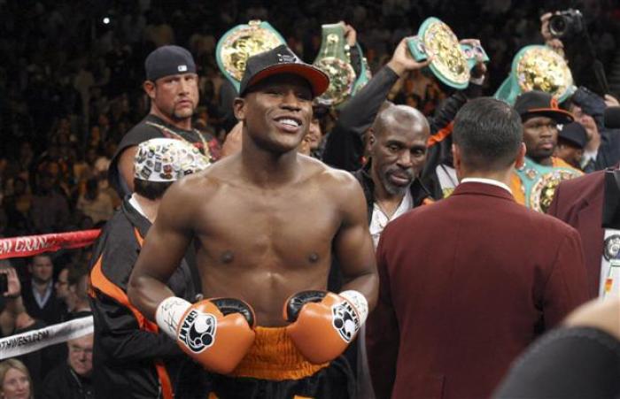 Floyd Mayweather Jr. of the U.S. stands in the ring before fighting WBC welterweight champion Victor Ortiz, also of the U.S., at the MGM Grand Garden Arena in Las Vegas, Nevada, September 17, 2011.