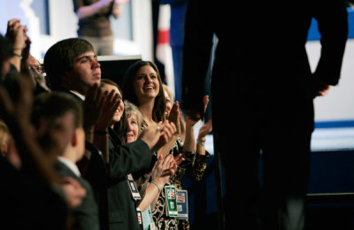 Republican supporters applaud during a rally in Orlando, October 20, 2007.