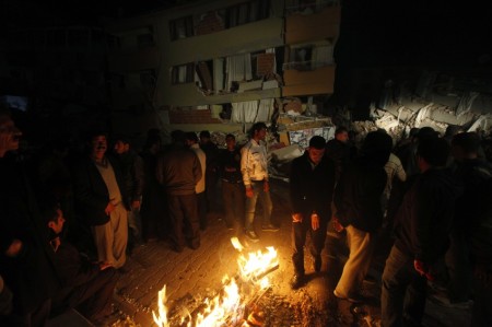 Victims of the earthquake gather for warmth in Ercis. Tents, food and water, and medical supplies are still desperately needed in the worst areas, as many find themselves homeless amid below-freezing temperatures.