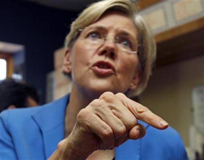 Elizabeth Warren speaks with voters as she campaigns after announcing her candidacy for the Senate in Framingham, Massachusetts, September 14, 2011.