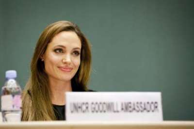 United Nations High Commissioner for Refugees (UNHCR) Goodwill Ambassador Angelina Jolie speaks during an annual meeting of UNHCR's governing executive committee in Geneva October 4, 2011.