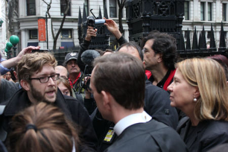 Discussion in front of Trinity Church between the Rev. Michael Ellick of Judson Church, who is a supporter of the Occupy movement, and the Rev. Matthew Heyd, Director of Faith in Action at Trinity, who came out to address the protesters.