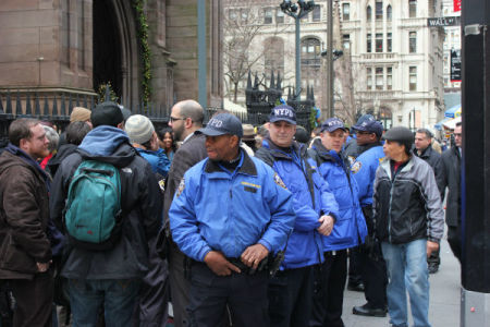 Police presence at Trinity Church was high despite the low turnout, outnumbering protesters almost two to one.