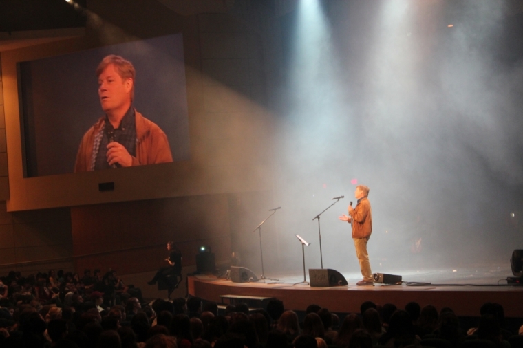 Hundreds of kids and teenagers gathered at the annual “New Year’s Aid” party at McLean Bible Church in Vienna, Virginia. The speaker is Russell Stendal, a missionary who was taken hostage by Colombian Marxist guerillas back in 1983.