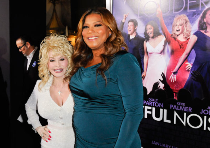 Cast members Dolly Parton (L) and Queen Latifah (R) arrive at the Hollywood premiere of 'Joyful Noise' in Los Angeles, California January 9, 2012.