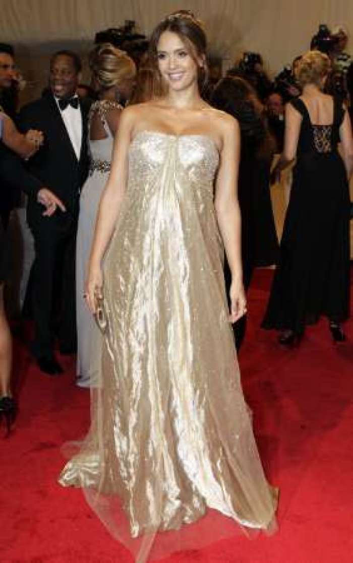 Actress Jessica Alba poses on arrival at the Metropolitan Museum of Art Costume Institute Benefit celebrating the opening of the exhibition 'Alexander McQueen: Savage Beauty' in New York May 2, 2011.