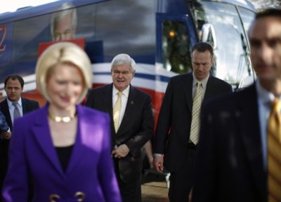 U.S. Republican presidential candidate and former Speaker of the House Newt Gingrich (C) arrives at the Florence Hospital to speak to supporters in South Carolina, January 17, 2012. The South Carolina Primary will be held on January 21.