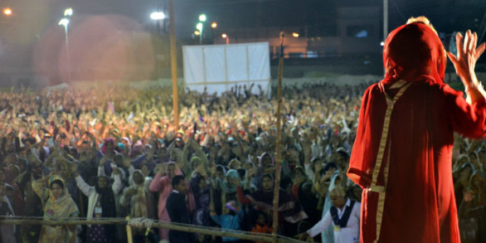 Marilyn Hickey prays with thousands at Karachi, Pakistan 'Night of Healing' meetings.