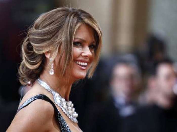 Model Kathy Ireland poses for photographers at the 82nd Academy Awards in Hollywood, California, March 7, 2010.