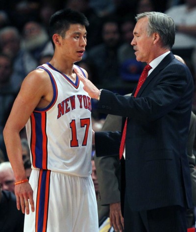 New York Knicks coach Mike D'Antoni talks with Jeremy Lin during game in the 2012 season.