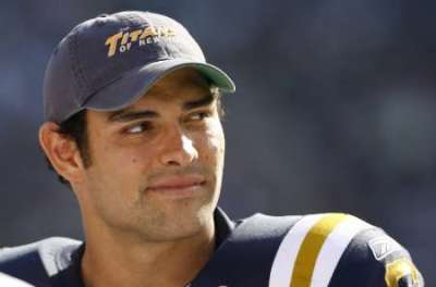 New York Jets quarterback Mark Sanchez watches the game against the Jacksonville Jaguars from the bench during the second half of their NFL football game in East Rutherford, New Jersey, September 18, 2011.