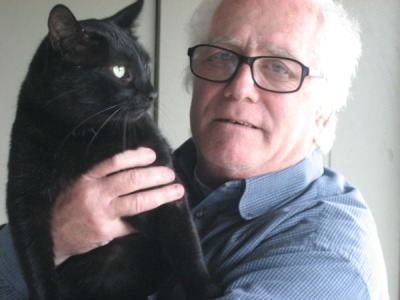 Patrick Greene and his cat, Big Boy, pose for the camera. Greene is an atheist activist who had to back off of his threat to sue Henderson County, Texas over a nativity scene a few months ago after he rapidly began losing his sight.