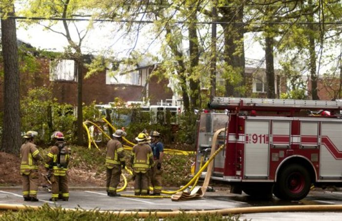 rginia Beach Fire Department extinguish the flames at the crash site, after an F/A-18D fighter jet crashed into an apartment complex in Virginia Beach April 6, 2012. The plane was part of a training squadron at Naval Air Station Oceana for Navy and Marine aviators in Virginia Beach.