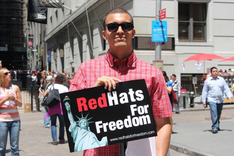 A young protester holds a sign at the Stand Up for Religious Freedom rally, held in New York City on June 8 to protest President Barack Obama's Affordable Care Act.