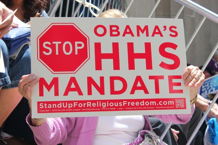 Woman holds a sign at the Stand Up for Religious Freedom Rally, held in New York City on June 8 to protest President Barack Obama's Affordable Care Act.