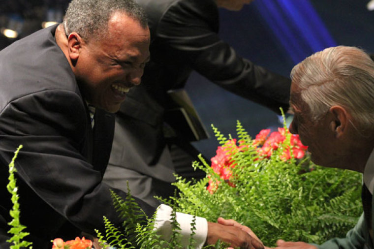 Fred Luter hugs an attendee at the Southern Baptist Convention's Annual Meeting in New Orleans, June 18, 2012. Luter was elected president of the SBC on June 19.