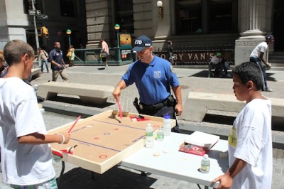 The NYPD teamed up with the Police Athletic League to play with children in NYC Wednesday, June 26, 2012.