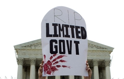 Sign held by protester in front of the Supreme Court after the court upheld the individual mandate of the Affordable Care Act, June 28, 2012.