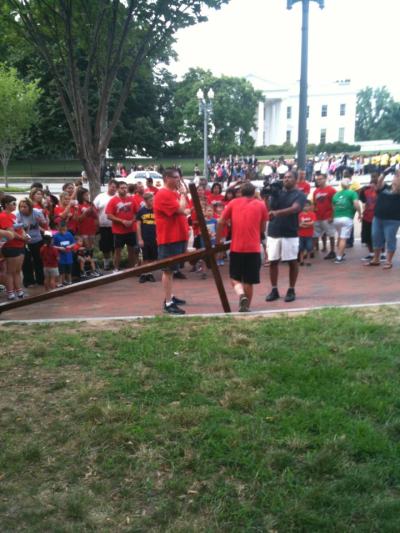 Junior Garcia is seen a photo published to The Oasis Church's Facebook page near the White House Friday, July 13, 2012 after traveling with a wooden cross for more than a month from his home in Saginaw, Texas.