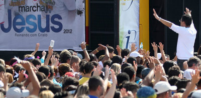 Thousands of people march during the Jesus Parade in downtown Sao Paulo July 14, 2012. The parade unites Christians and Evangelical churches in a public expression of faith, praising and worshipping Jesus Christ.