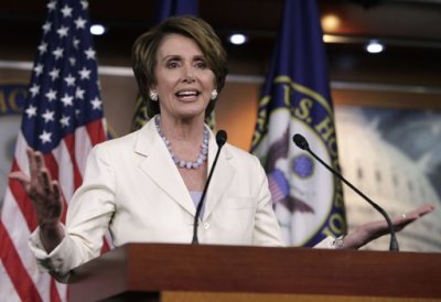 U.S. House Minority Leader Nancy Pelosi (D-CA) gestures during news conference on President Barack Obama's signature healthcare law on Capitol Hill in Washington June 28, 2012.