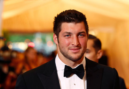 New York Jets quarterback Tim Tebow arrives at the Metropolitan Museum of Art Costume Institute Benefit celebrating the opening of 'Schiaparelli and Prada: Impossible Conversations' exhibition in New York, May 7, 2012.