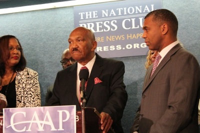 Rev. William Owens Sr. (center), founder and president of the Coalition of African-American Pastors (CAAP), with his wife and at the Edward R. Murrow Room at the National Press Club in Washington, DC.