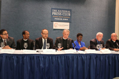 Circle of Protection press conference with (left to right) Gabriel Salguero, president of the National Latino Evangelical Coalition, Rev. Michael Livingston, former president of the National Council of Churches, Galen Carey, vice president of government relations for the National Association of Evangelicals, Rev. David Beckmann, president of Bread for the World, Barbara Williams-Skinner, co-facilitator of the National African American Clergy Network, Jim Wallis, president and CEO of Sojourners, and Bishop Stephen Blaire, chair of the committee on domestic justice and human development for the U.S. Conference of Catholic Bishops, on September 12, 2012, Washington, D.C.