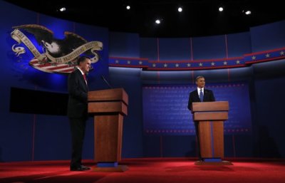 U.S. President Barack Obama (R) and Republican presidential candidate Mitt Romney take their positions at the start of the first 2012 U.S. presidential debate in Denver, Colorado October 3, 2012