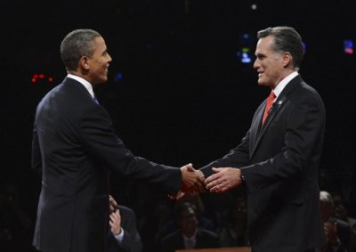 Republican presidential nominee Mitt Romney shakes hands with President Barack Obama at the start of the first 2012 U.S. presidential debate in Denver October 3, 2012.