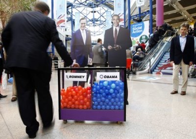 Delegates place mock votes for U.S. President Barack Obama and Republican presidential nominee Mitt Romney at the Conservative Party conference in Birmingham, central England,October 9, 2012.