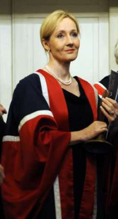 Author JK Rowling holds a University Benefactor's award, after receiving it from Britain's Princess Anne at the University of Edinburgh, in Edinburgh, Scotland September 26, 2011. Princess Anne was installed as Chancellor of the University of Edinburgh on Monday, succeeding her father Prince Philip, who stepped down in 2010.