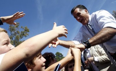 U.S. Republican presidential nominee and former Massachusetts Governor Mitt Romney greets supporters at a campaign rally in Chesapeake, Virginia, October 17, 2012.