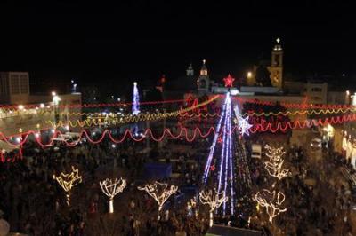 Thousands gather at the Church of the Nativity in Bethlehem on the West Bank to celebrate the birth of Jesus on Dec. 24, 2011.