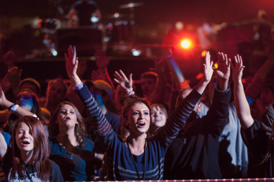 A group of students join in praise at the Passion 2013 conference in Atlanta, Georgia, on January 1, 2013. Over 60,000 students and ministry leaders are participating in the four-day event this year - the largest single Passion gathering in North America in the movement's history.