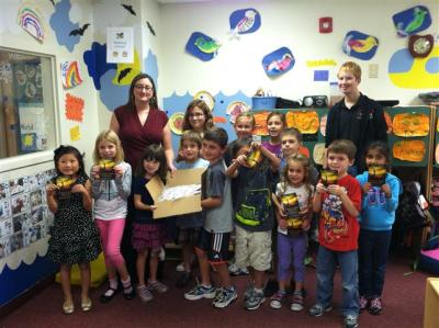 Released to DVD on Jan. 8, 2013, 'The Little Red Wagon' tells the story of Zach Bonner, pictured with children who are involved with his Little Red Wagon Foundation.