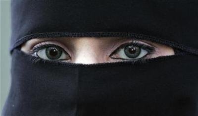 A Muslim woman covers herself with a veil in accordance to Islamic law. An extremist Salafist preacher in Egypt recently suggested Christian women cover themselves to avoid being raped.